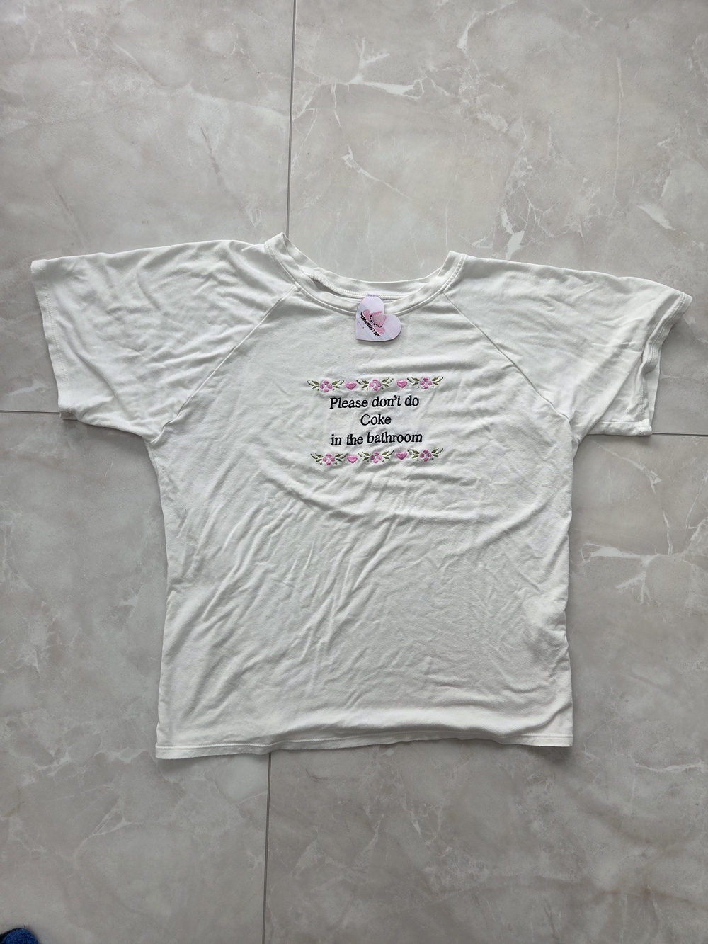 omighty White Tee with Pink Floral Embroidery and Black Text